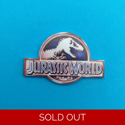 Jurassic World logo pin badge